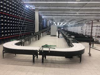 BKM Kitap Bursa yüksek raflı depoda otomatik konveyör sistemi